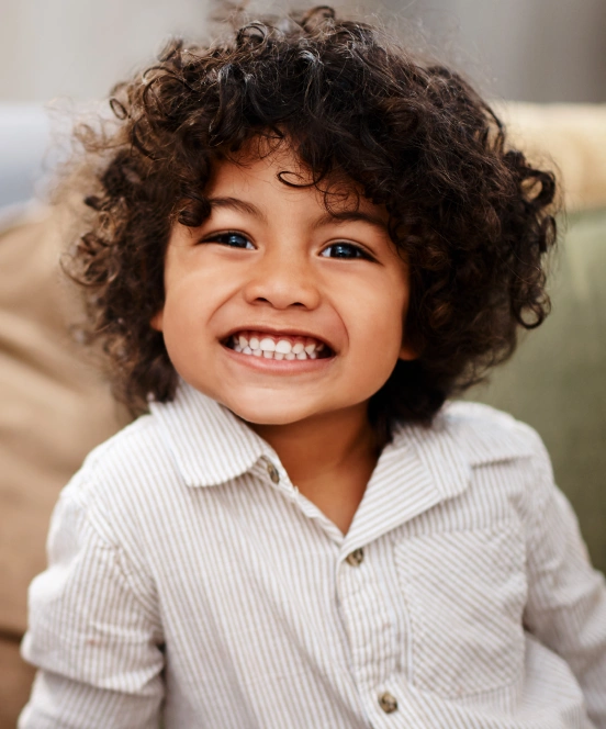 Smiling child representing preventive dental care for healthy teeth