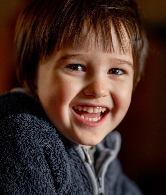Happy child smiling after a gentle pediatric dental appointment